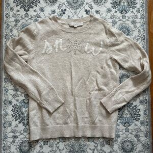 Cute cream color sweater from LOFT. Size s. SNOW letters on the front.